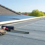 A flat roof with the best commercial roofing materials being installed.