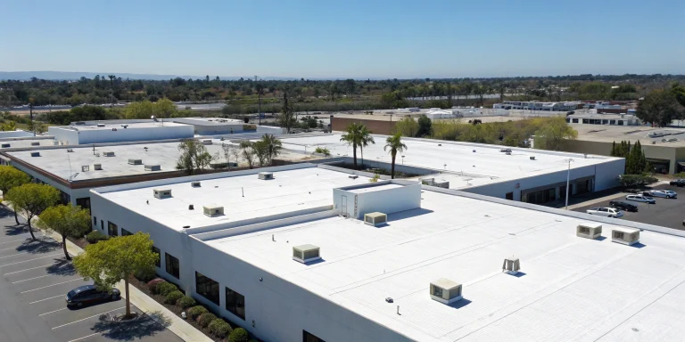 A commercial building with a flat roof, a job for the best commercial roofing companies in California.