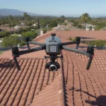 FAA registered drone hovering above a residential clay tile roof in Southern California